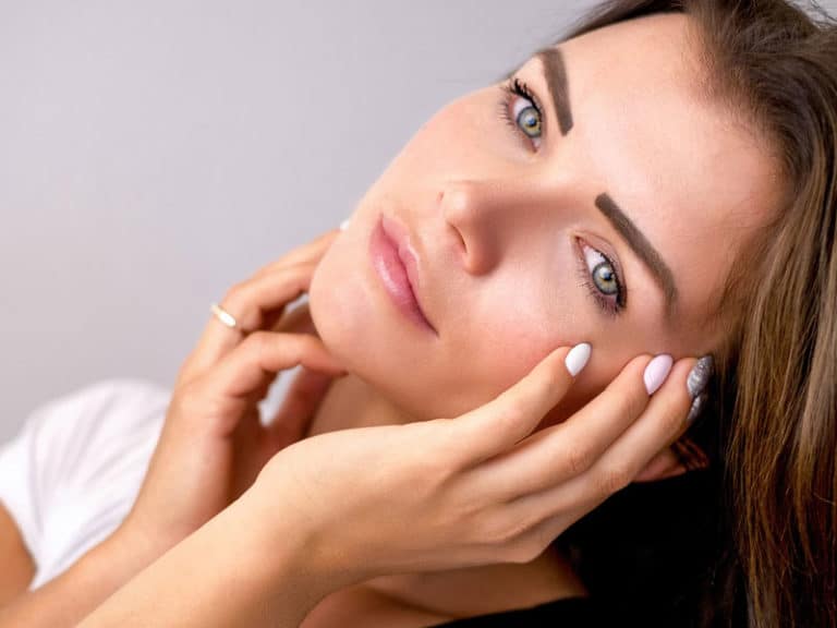 Woman thinking, to illustrate her possible hysterectomy and hormone changes